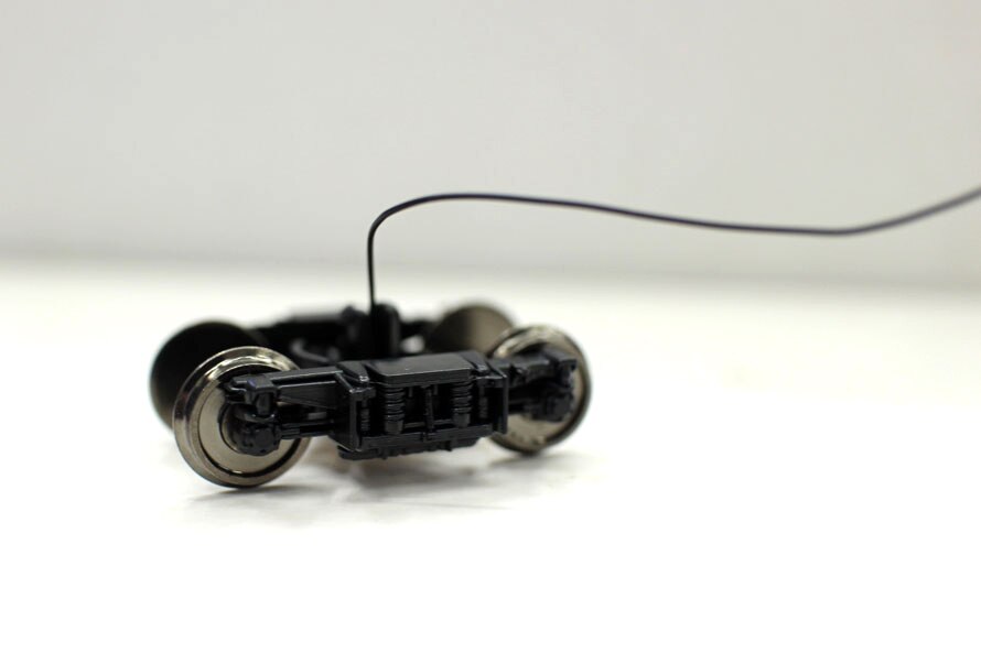 1/87 HO ratio Underframe of train carriage bogie Assembly Refitting parts of train toy model Electrical connection 1/87 HO ratio Underframe of train carriage bogie Assembly Refitting parts of train toy model Electrical connection