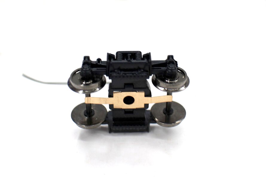 1/87 HO ratio Underframe of train carriage bogie Assembly Refitting parts of train toy model Electrical connection 1/87 HO ratio Underframe of train carriage bogie Assembly Refitting parts of train toy model Electrical connection